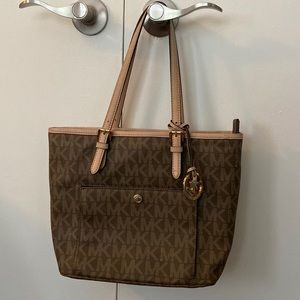 Brown and tan Michael Kors handbag very gently used